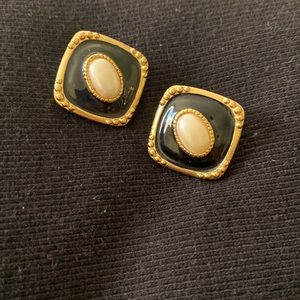 Black enamel earrings with pearl accent.